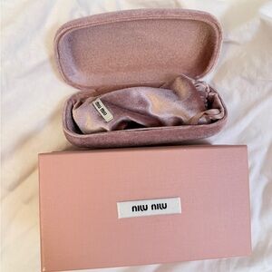 MiuMiu Havana Oval SMU 04Z Glasses